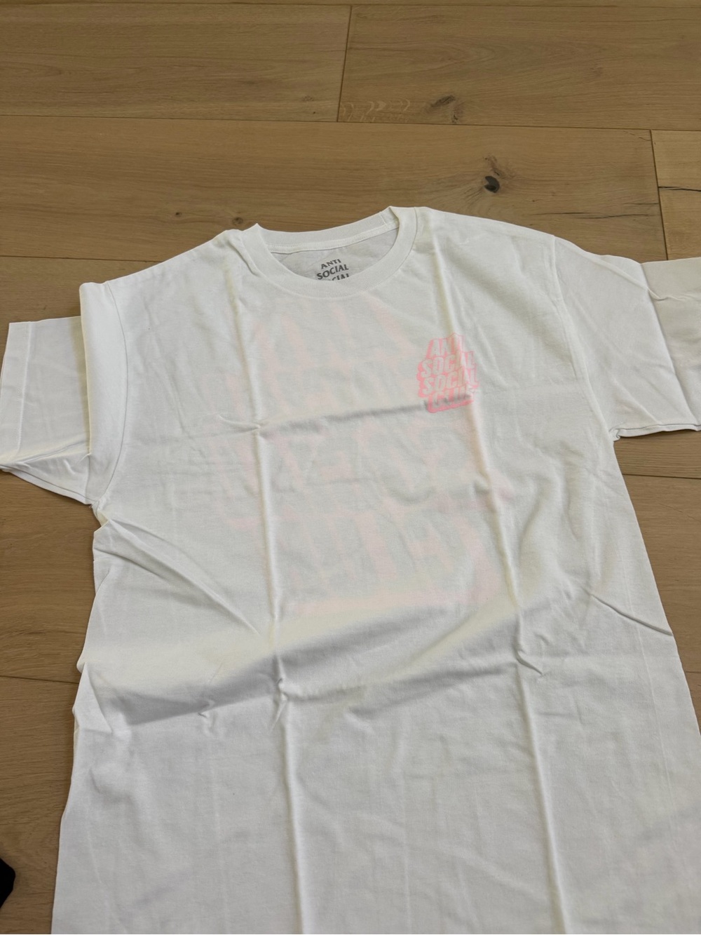 Anti Social Social Club White Tee with Pink Chest Logo